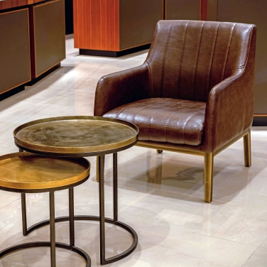 Close up picture of a chair and coffee table